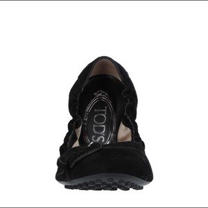 Todd’s black ballet flats